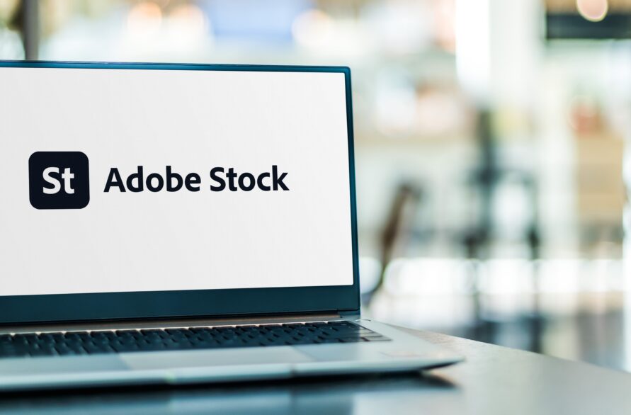 Adobe Stockが表示されたノートパソコン